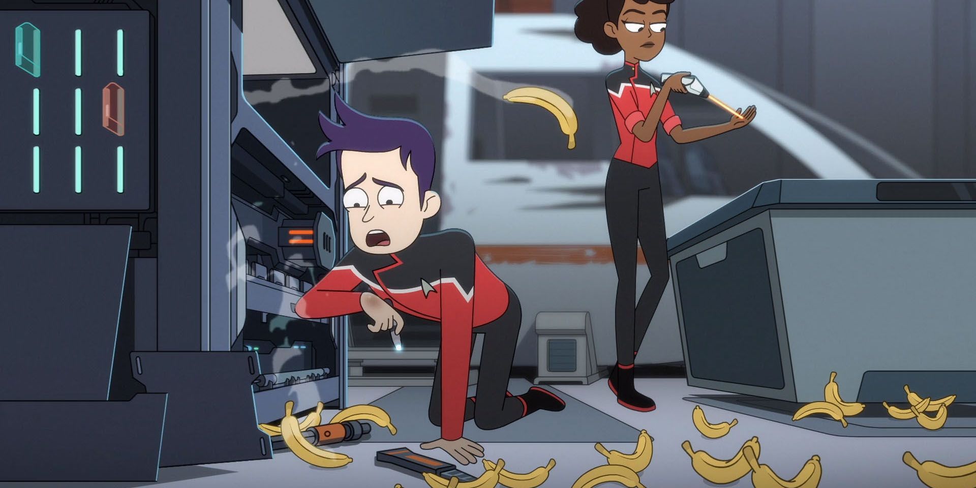 Brad Boimler studies a broken replicator with bananas everywhere while Beckett Mariner tests a phaser in the background Star Trek Lower Decks
