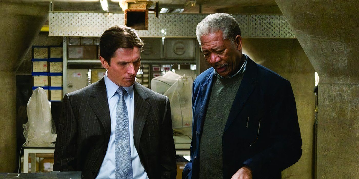 Bruce Wayne and Lucius Fox look at tech in Batman Begins