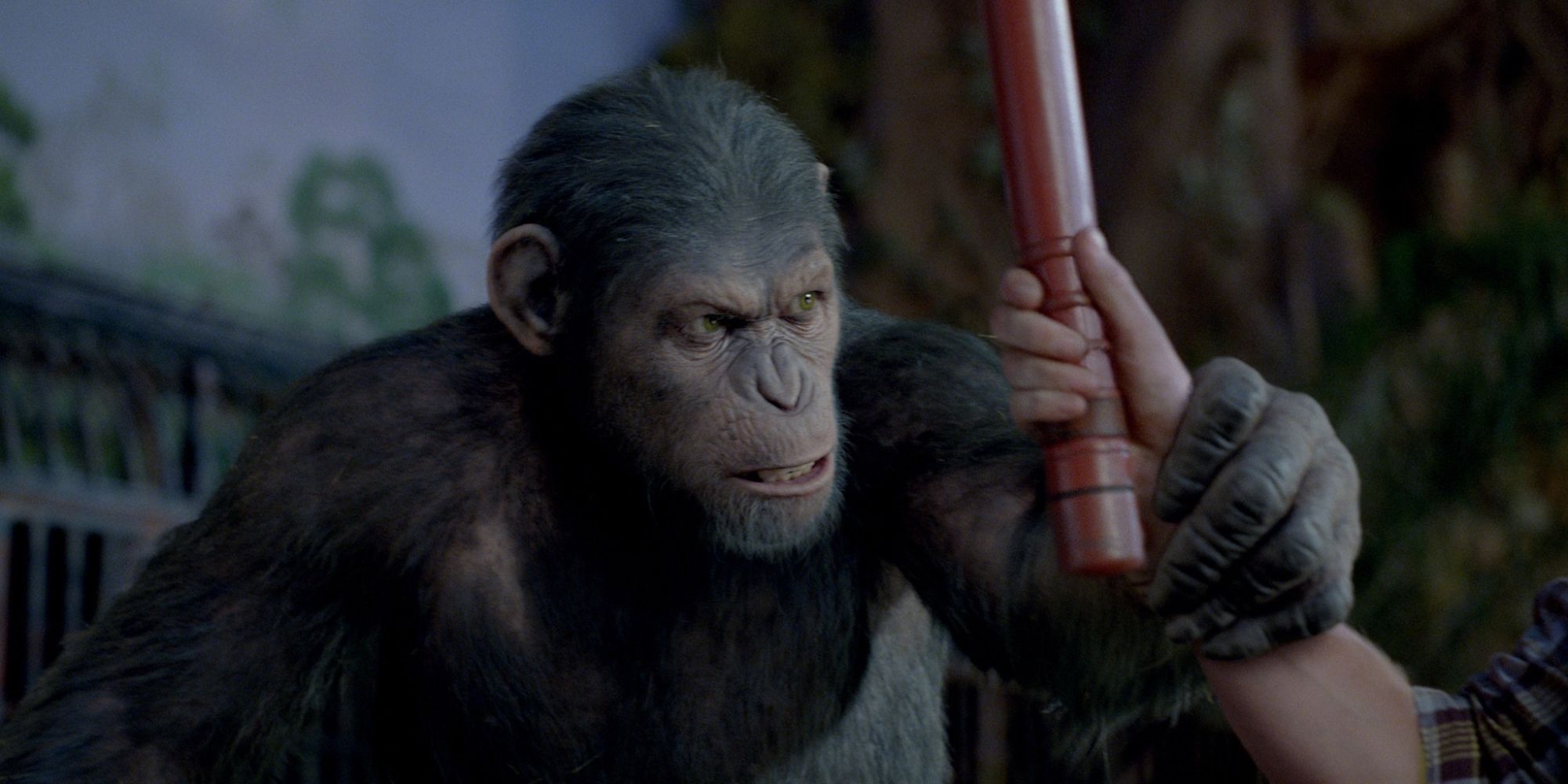 Caesar fights for the electric baton in Rise of the Planet of the Apes, 2011.