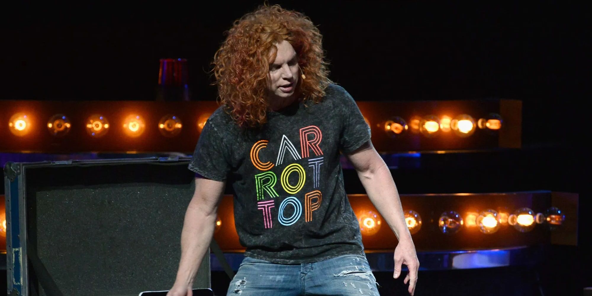 Carrot Top performing on stage
