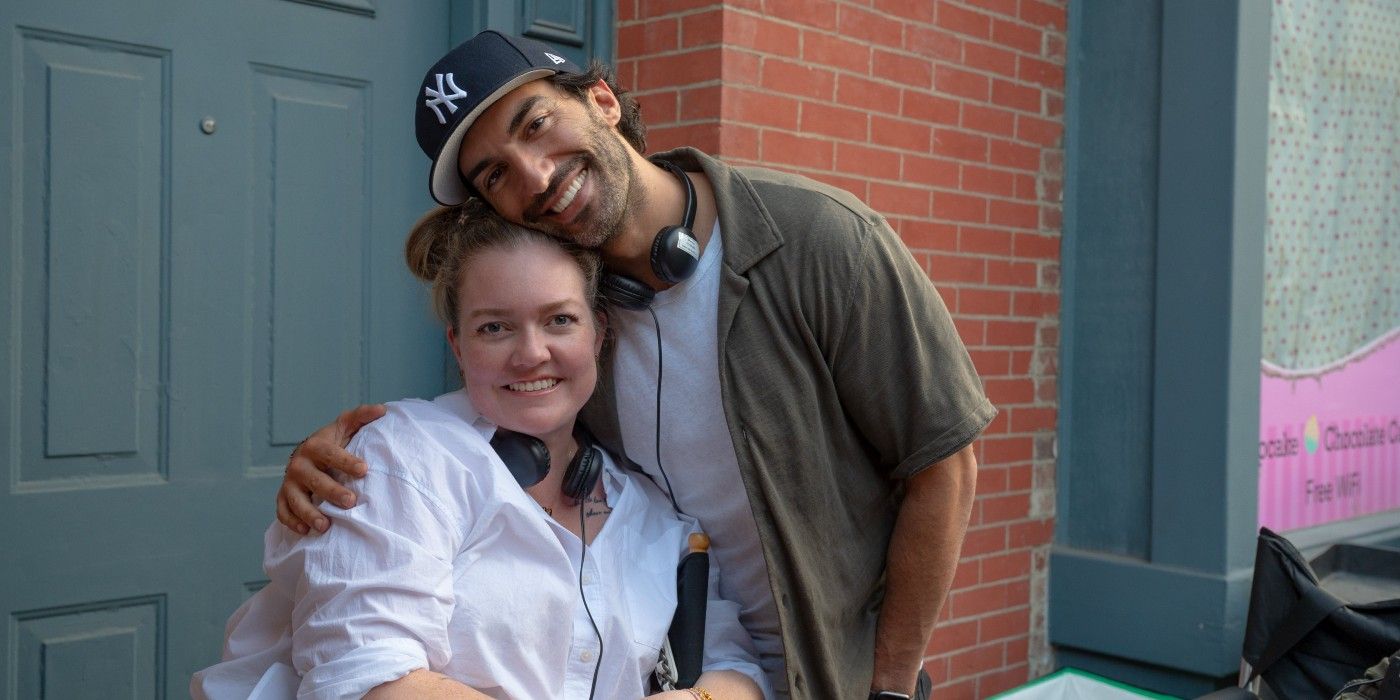 Colleen Hoover and Justin Baldoni hug on the set of It Ends With Us