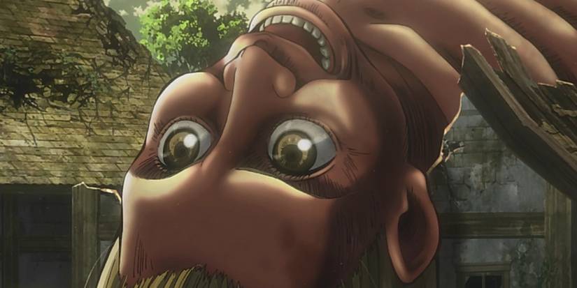 Connie's Mom in her Titan form as she lays on top of her house in Attack on Titan.
