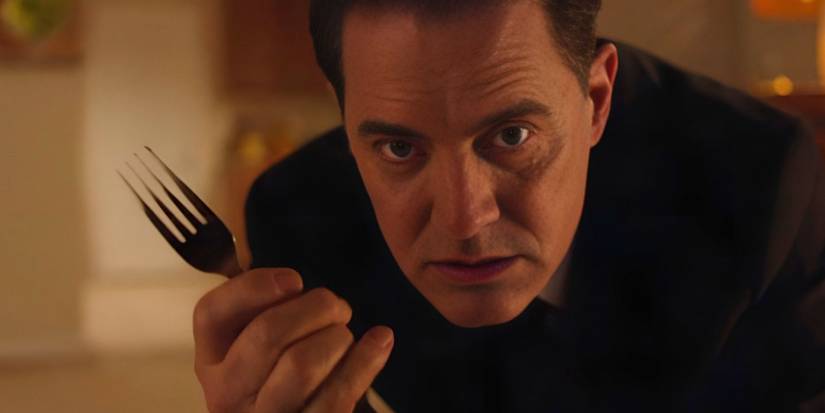 Dale Cooper (Kyle MacLachlan) tries to escape a strange realm using an electric socket in Twin Peaks - The Return
