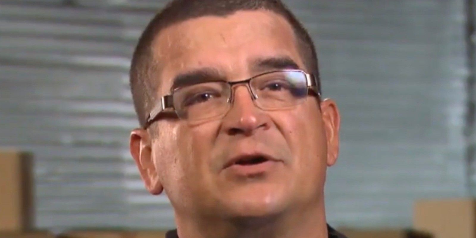 dave hester from storage wars wearing glasses and looking serious in a close up