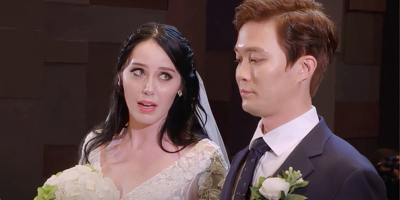 Deavan Clegg in white bridal outfit holding flowers looking at Jihoon Lee in navy blue suit In 90 Day Fiance on their wedding day.