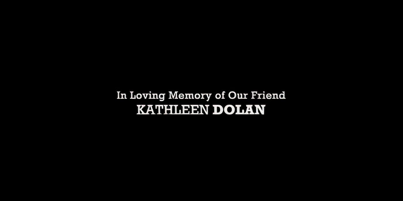 Dedication card to Kathleen Dolan that reads In Loving Memory of Our Friend KATHLEEN DOLAN.