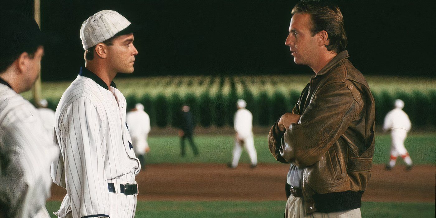 Kevin Costner and Ray Liotta talking on a baseball diamond in Field of Dreams