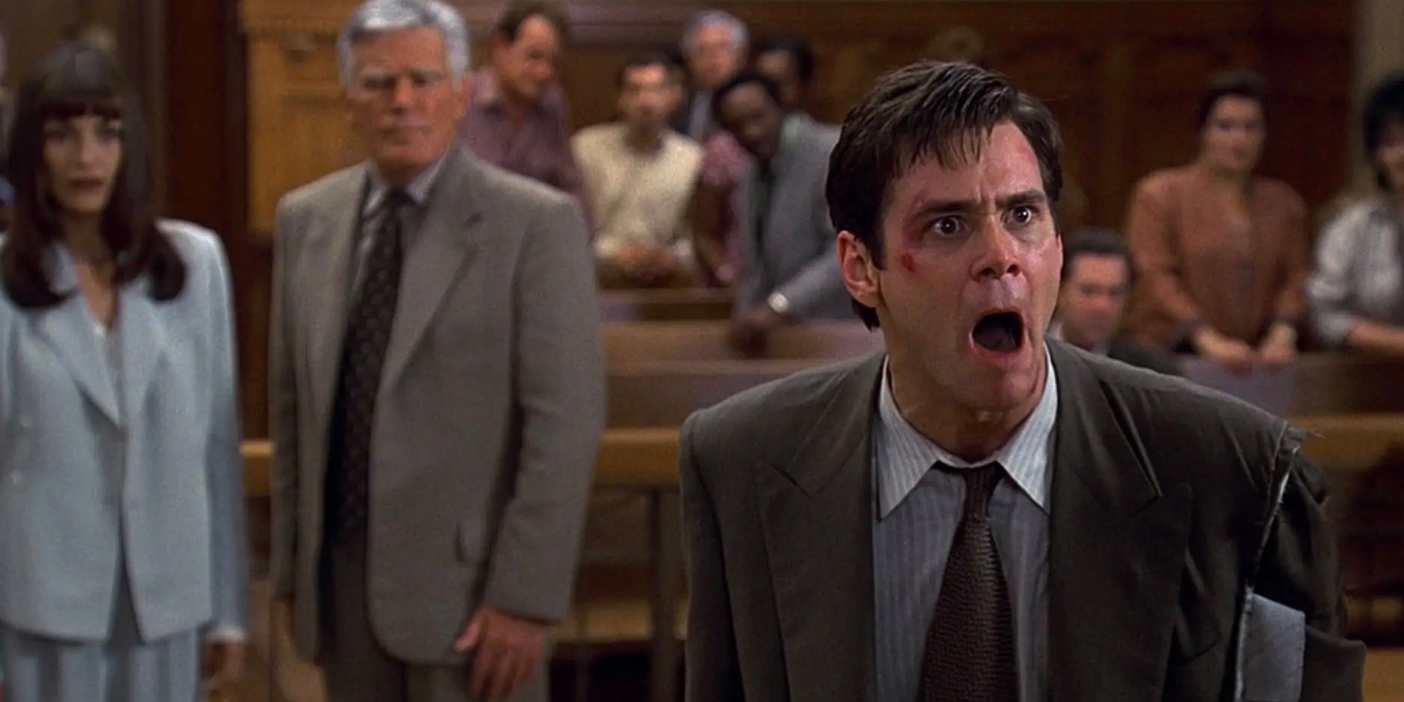 Jim Carrey grita no tribunal. 
