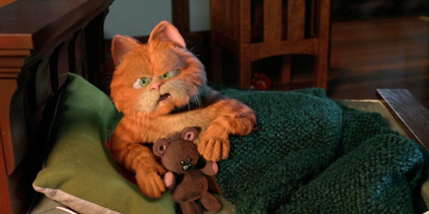 Garfield parece irritado na cama em Garfield The Movie