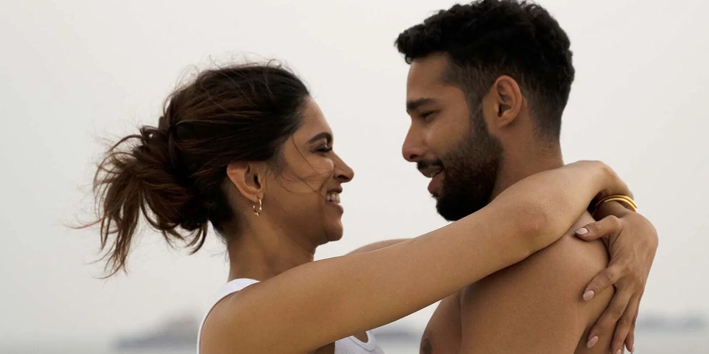 Al Khanna (Deepika Padukone) smiles and puts her arms around Zain Oberoi (Siddhant Chaturvedi) in Gehraiyan