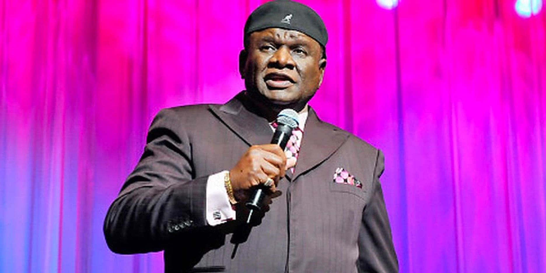 George Wallace performing on stage