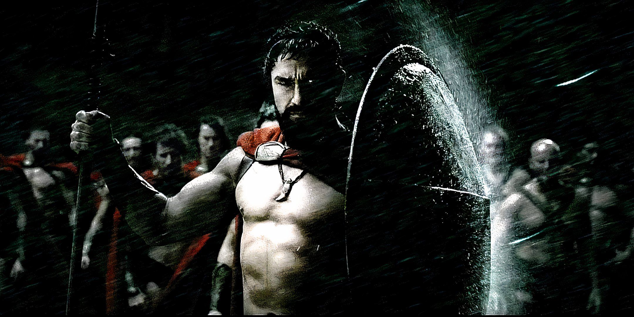 Gerard Butler as King Leonidas holding his shield against the rain in 300