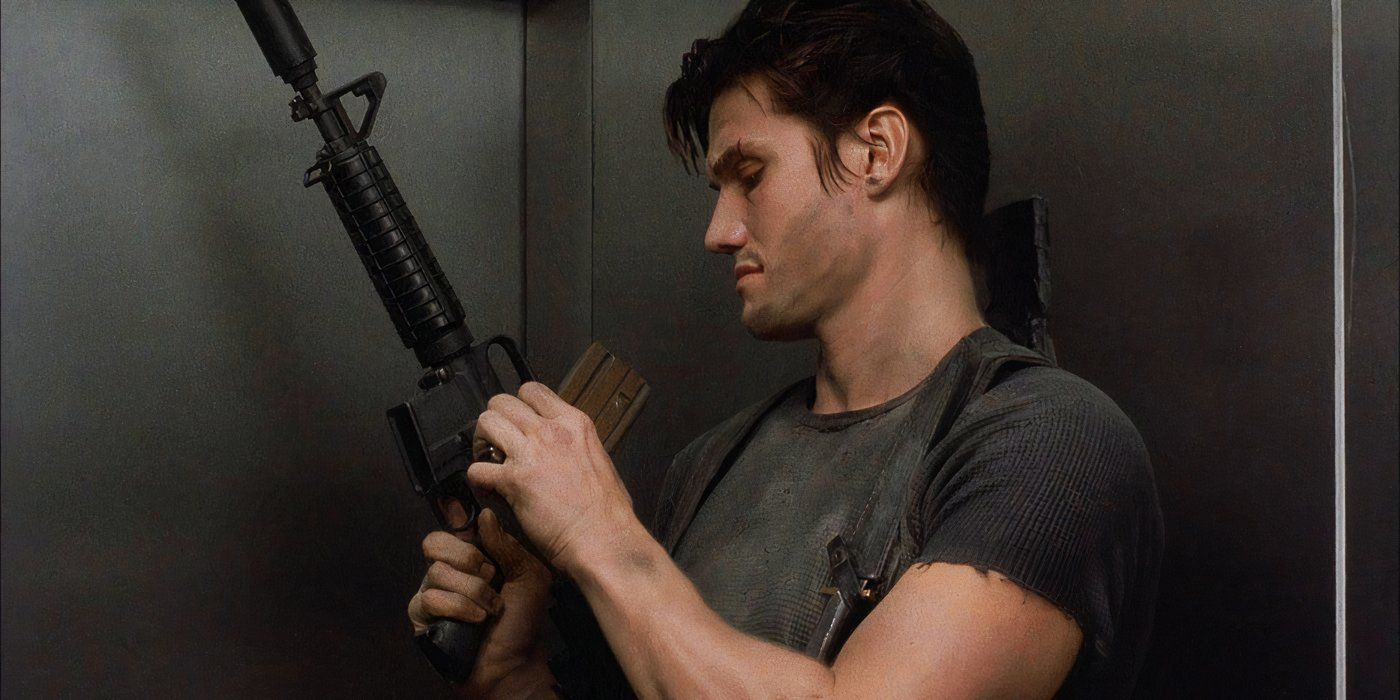 Dolph Lundgren as the Punisher loading an ᴀssault rifle in The Punisher (1989)