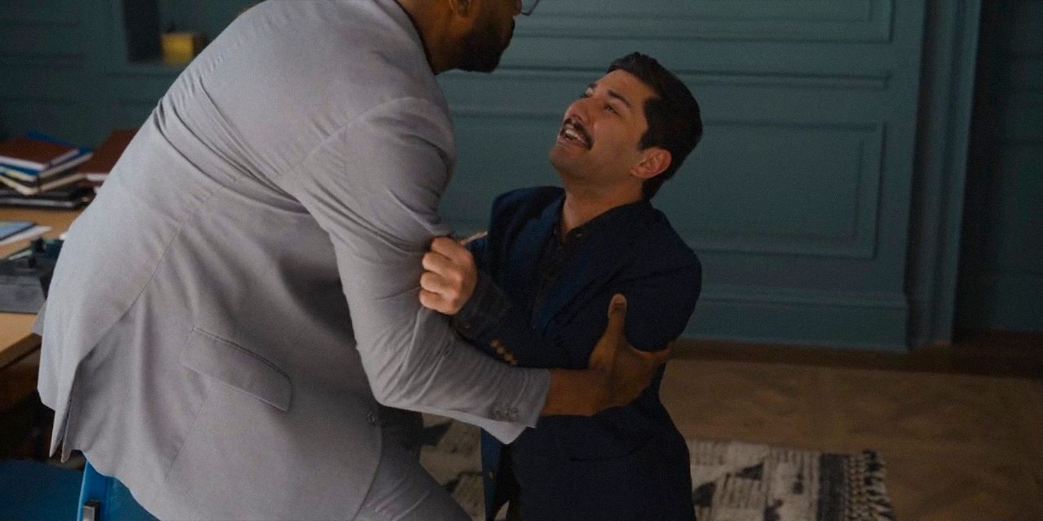 Damien (Mark Indelicato) crying in despair, begging Marcus (Carl Clemons-Hopkins) not to leave in Hacks season 3 episode 9