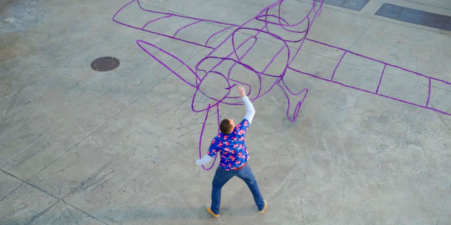 Zachary Levi as Harold drawing a plane with his crayon in Harold and the Purple Crayon