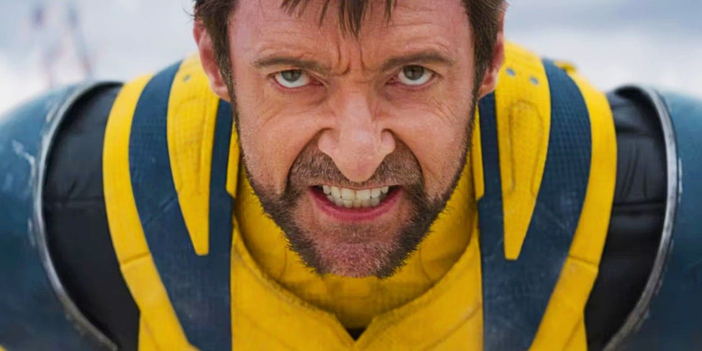 Hugh Jackman's Wolverine looking angry in the yellow and blue costume in Deadpool & Wolverine