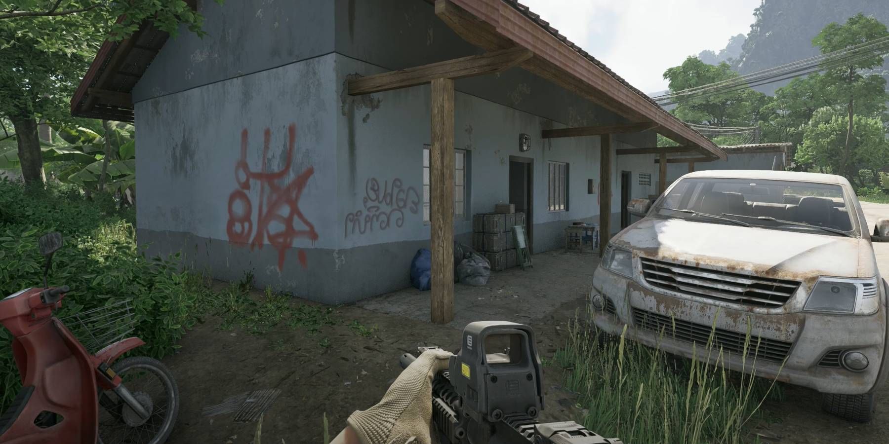 Esconderijo inimigo da guerra na zona cinzenta marcado por graffiti vermelho