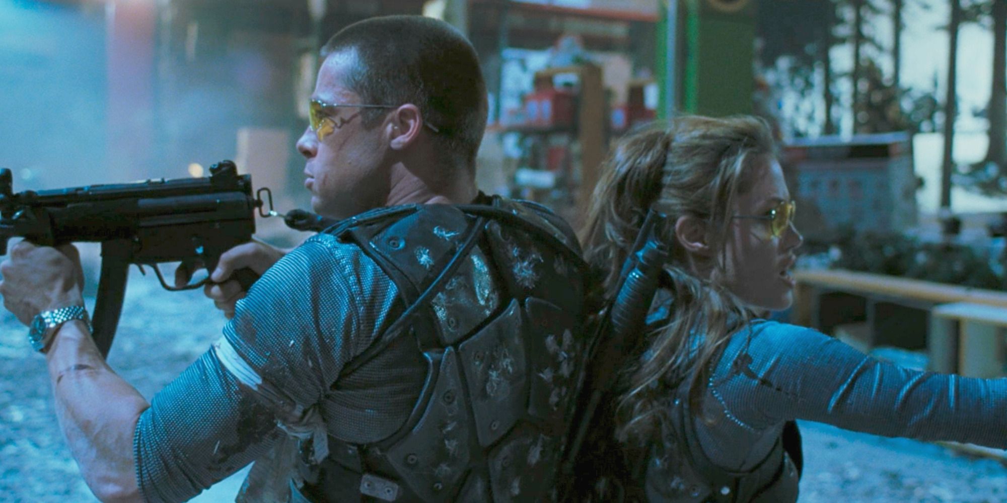 John (Brad Pitt) and Jane (Angelina Jolie) take aim on Mr. & Mrs. Smith
