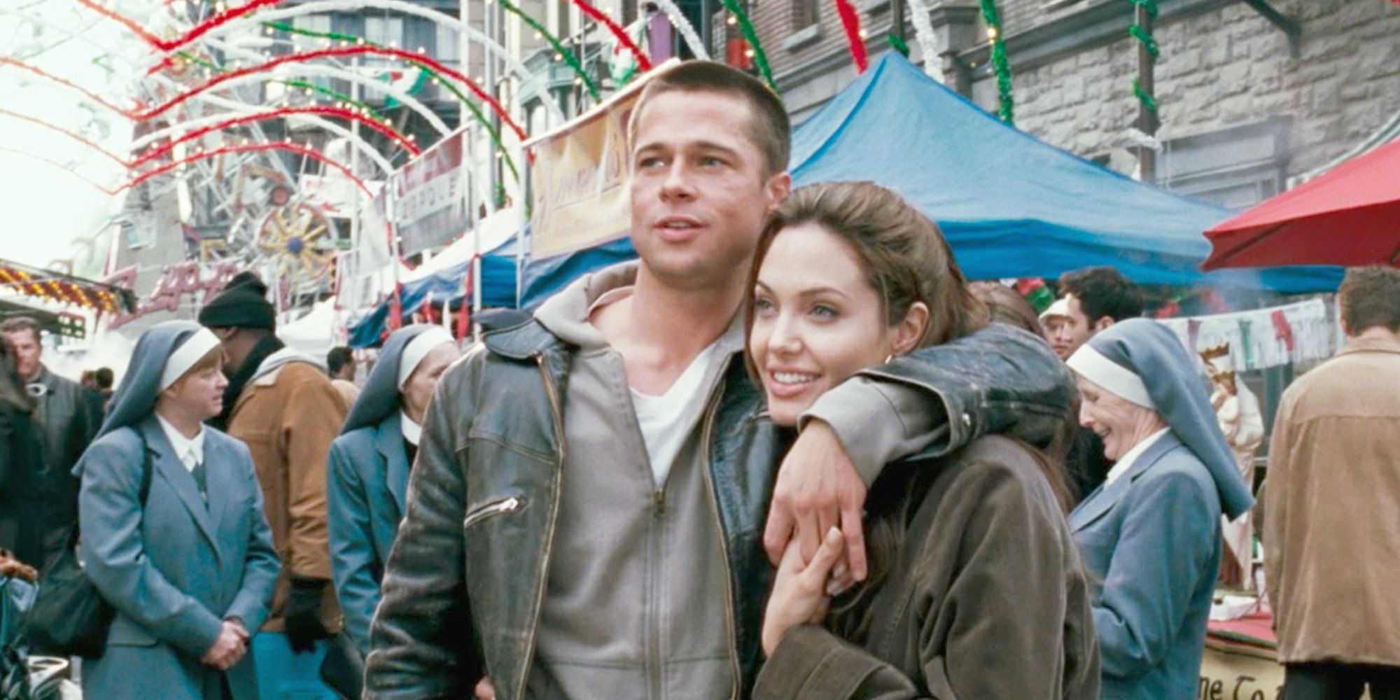 John (Brad Pitt) and Jane (Angelina Jolie) embrace on Mr. & Mrs. Smith