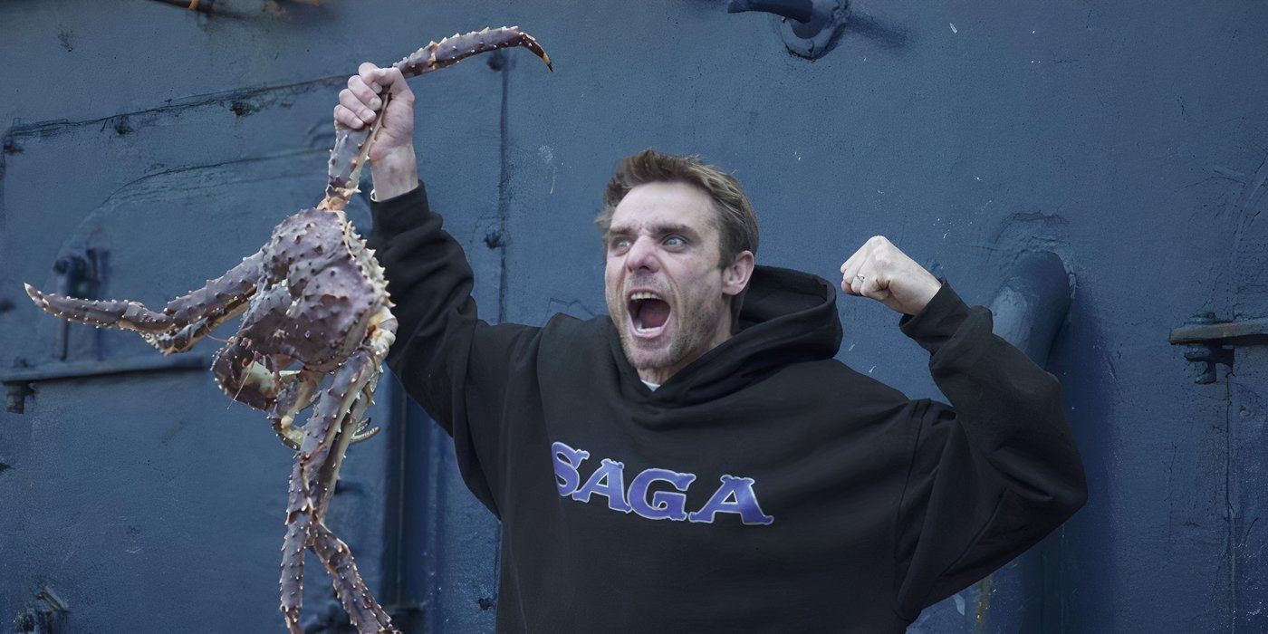 Jake Anderson holding up a crab and cheering on the Saga in Deadliest Catch