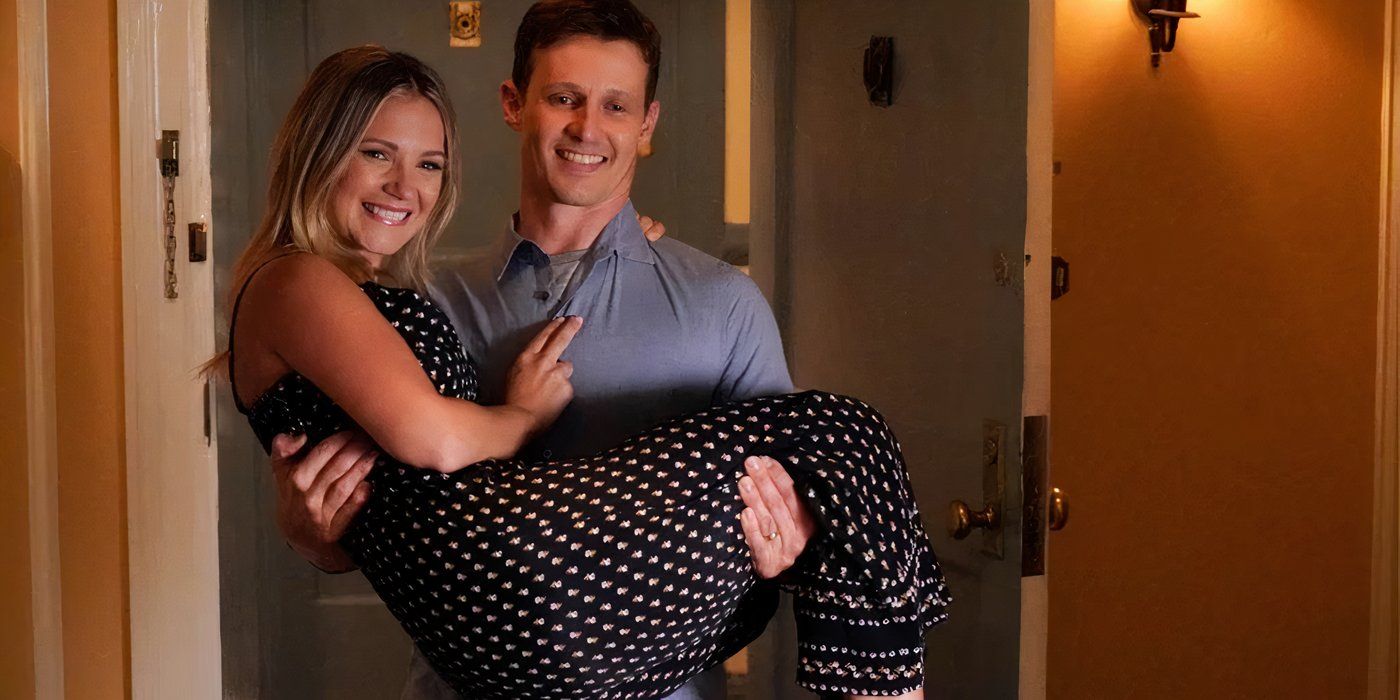Jamie (Will Estes) carrying Eddie (Vanessa Ray) into a room in Blue Bloods.