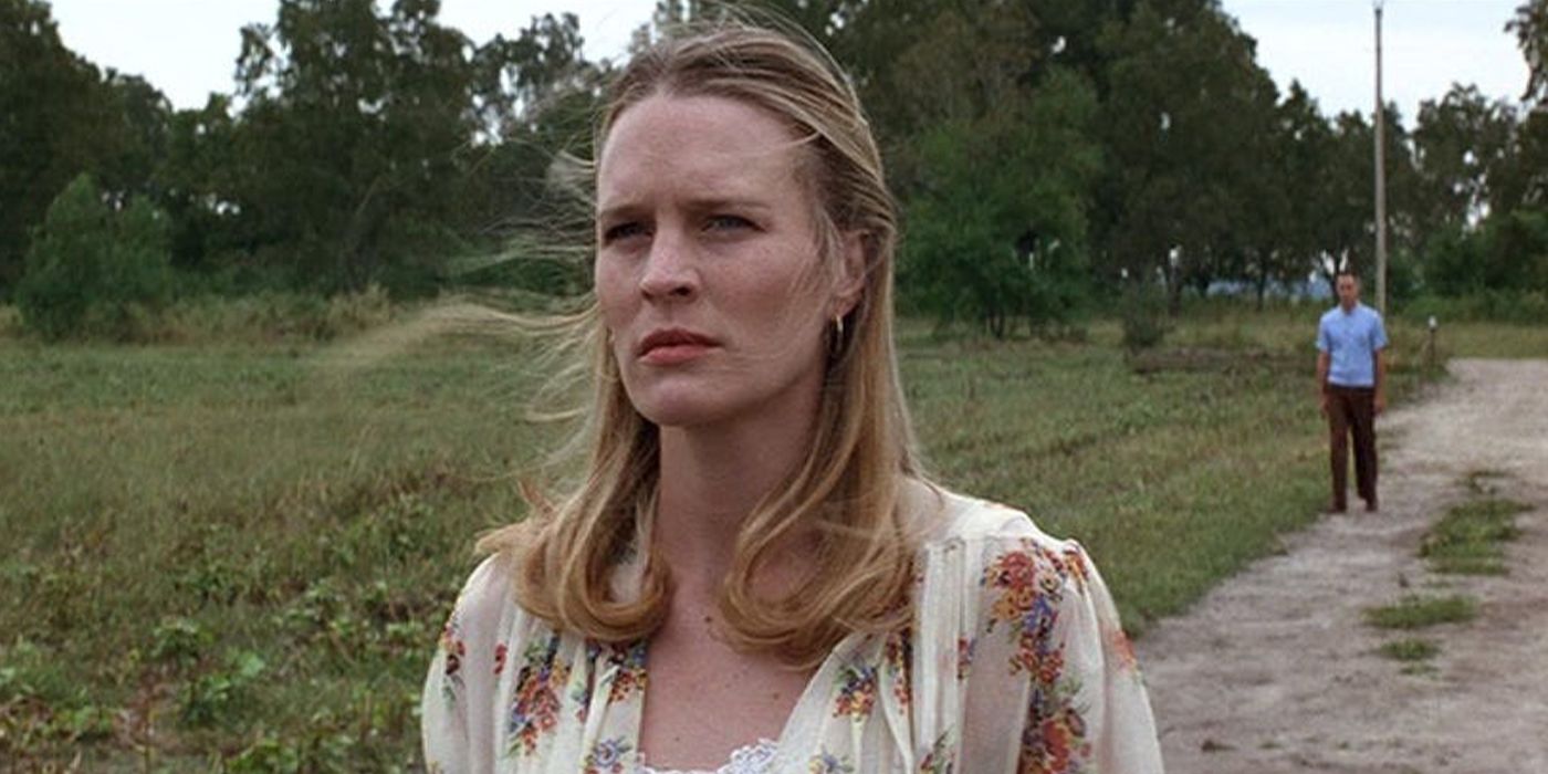 Robin Wright sadly walking away from Tom Hanks on a dirty road in a scene from Forrest Gump