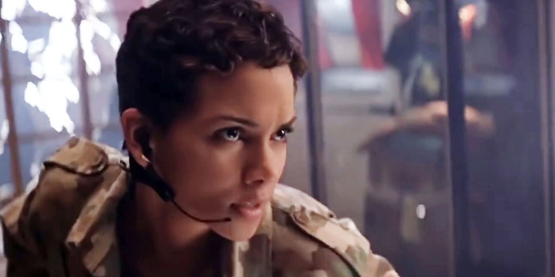 Jinx talking into headset in Die Another Day