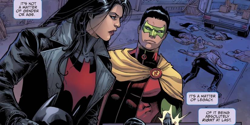 Comic book panel: John Grayson's Robin talking to Earth-2's Batman after they defeated criminals who are knocked out in the background.