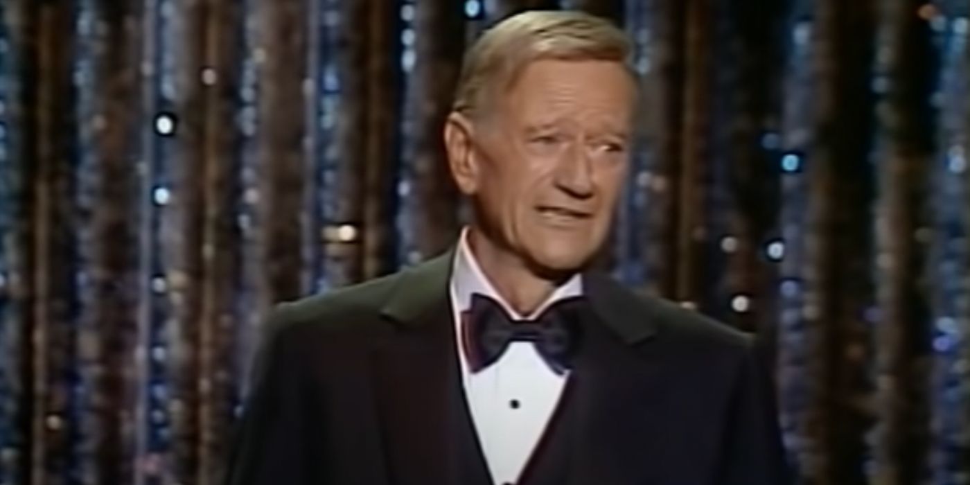 John Wayne presenting in a tuxedo at the 51st Academy Awards ceremony in 1979