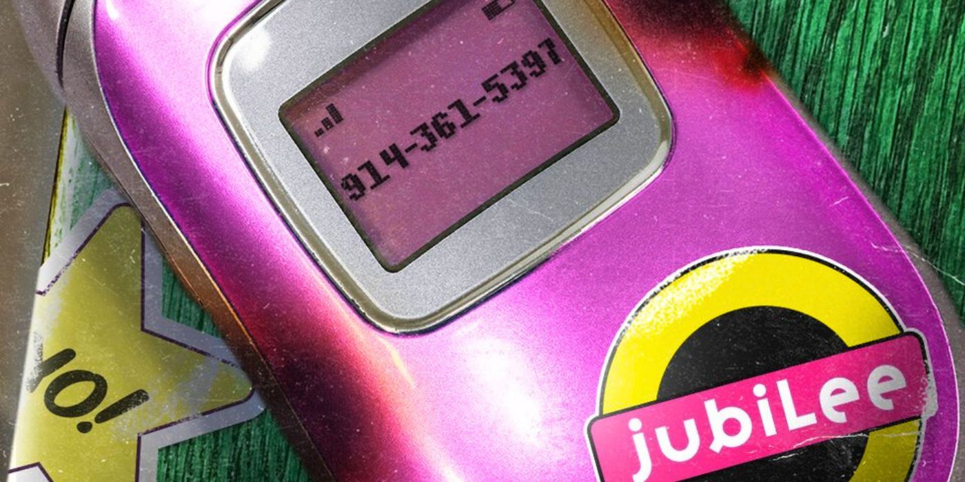 Jubilee's pink cellphone with the phone number 914-361-5397 on top
