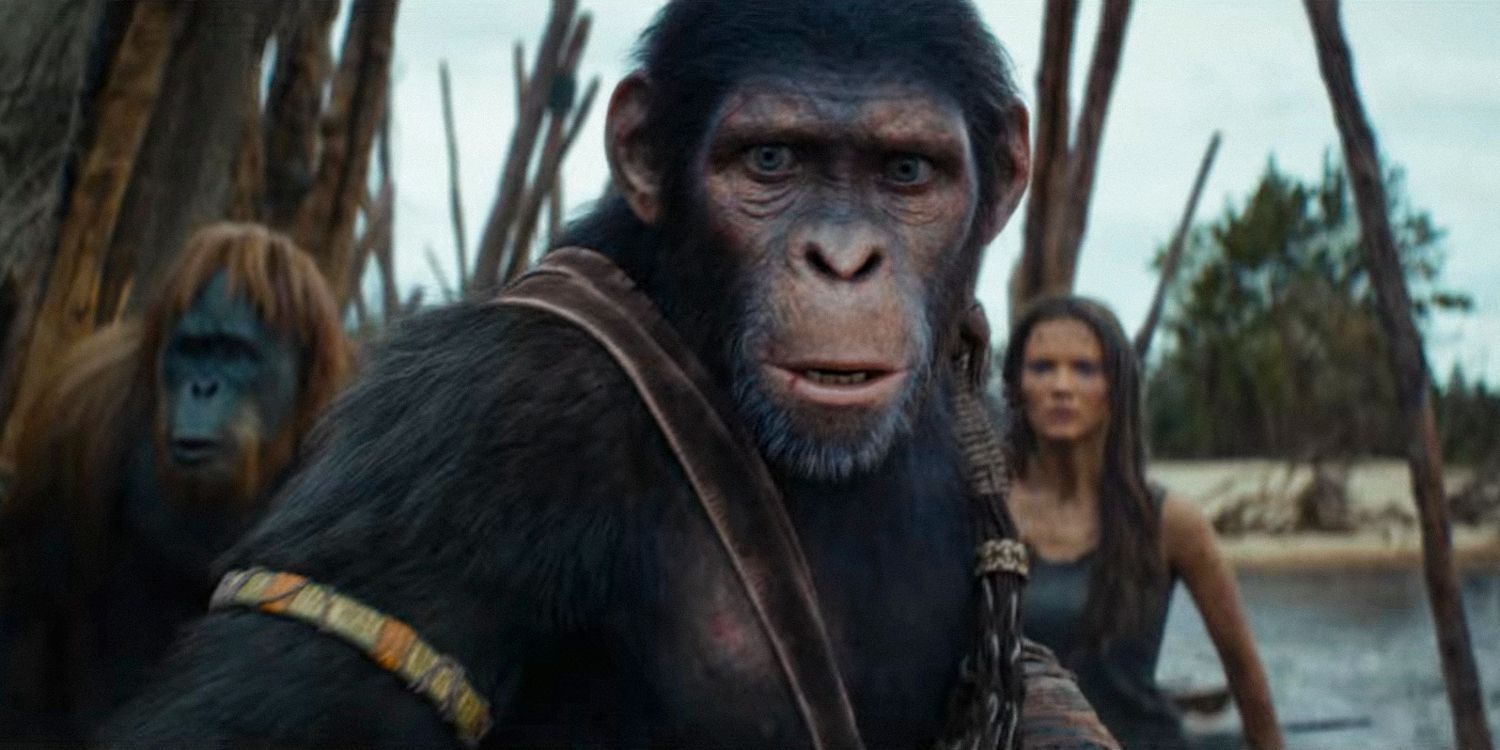 Noa attempts to protect Mae and Raka, standing in front of them in Kingdom of the Planet of the Apes