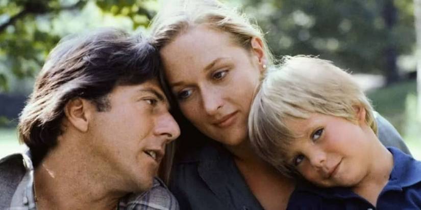 Ted (Dustin Hoffman), Joanna (Meryl Streep), and Billy (Justin Henry) all hugging in Kramer vs. Kramer.