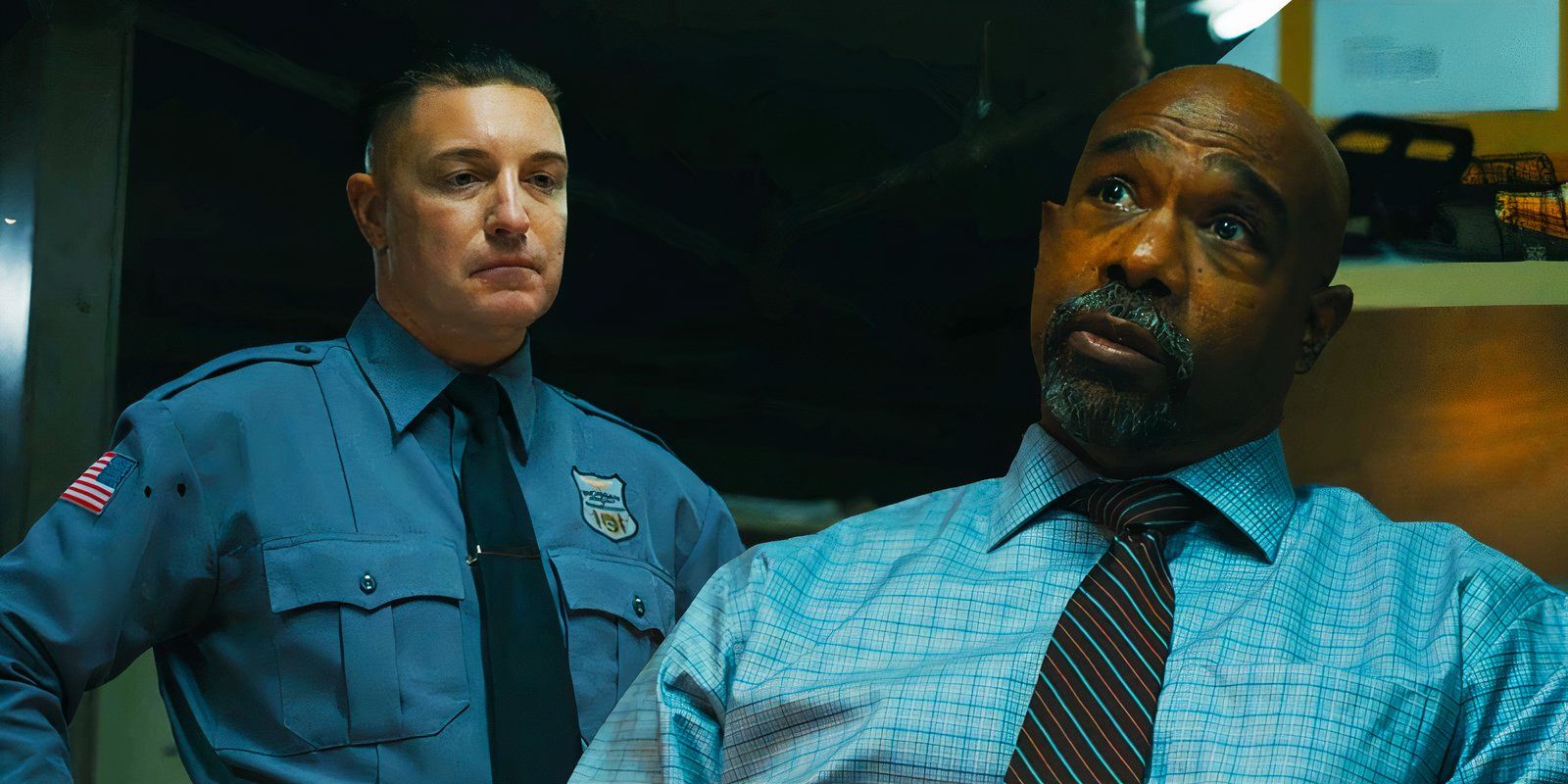 Lane Garrison as Carney and Michael Beach as Kareem Moore in Mayor of Kingstown season 2 episode 6