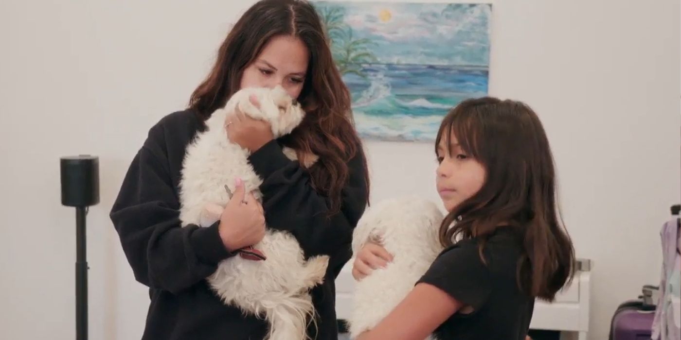 Liz Woods with daughter Ryleigh In 90 Day Fiance playing with Big Ed's dogs