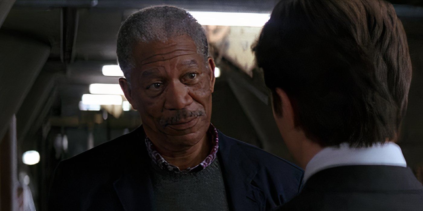 Lucius Fox talks to Bruce Wayne in Batman Begins