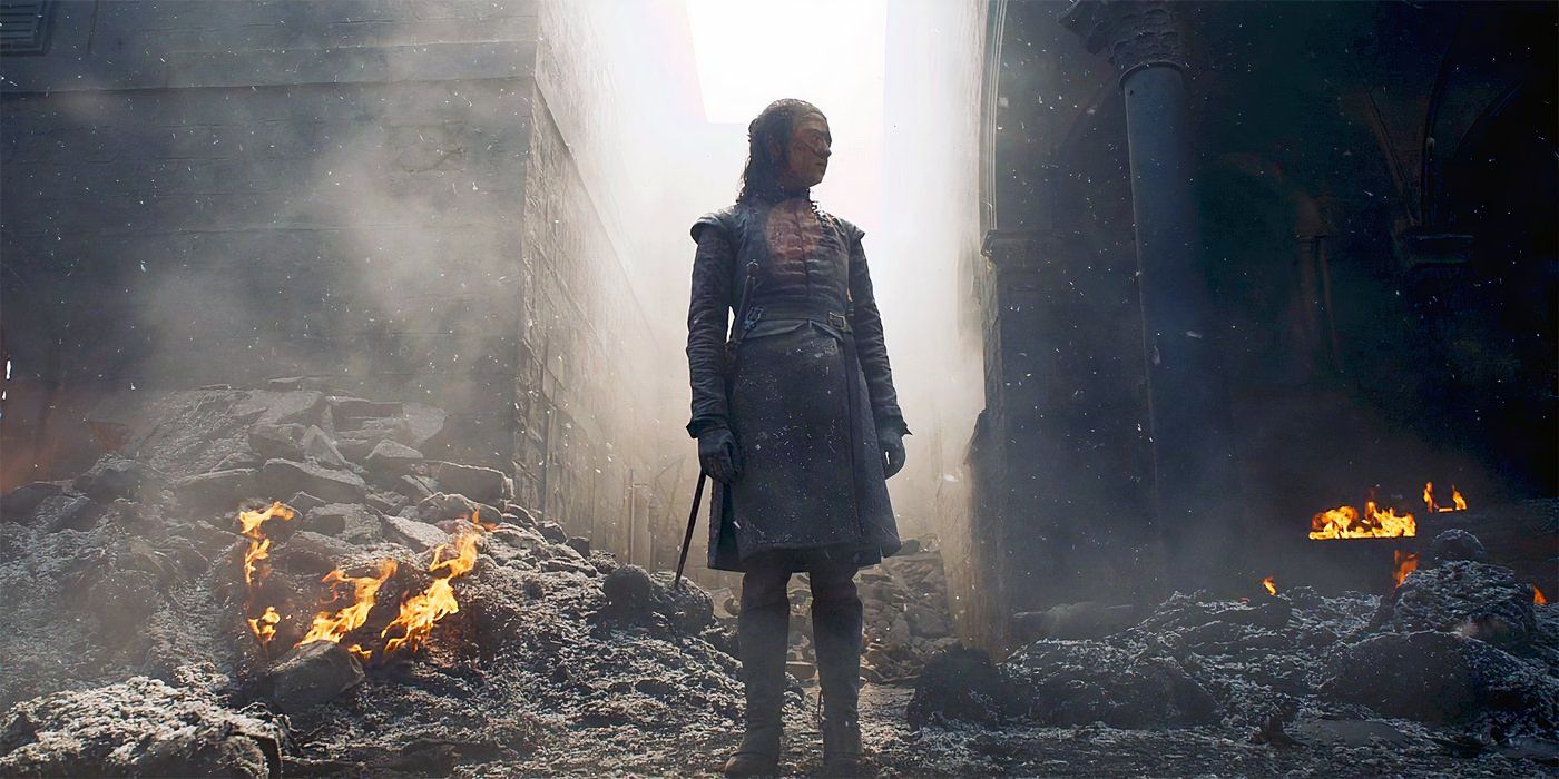 Maisie Williams as Arya Stark standing in King's Landing wreckage in Game of Thrones season 8 episode 5