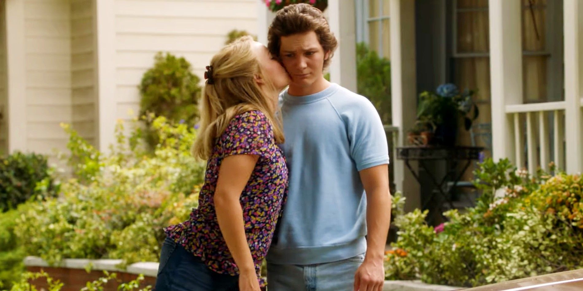 Mandy kisses Georgie's cheek while at their front lawn in Georgie & Mandy's First Marriage trailer