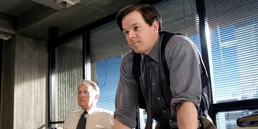 Mark Wahlberg and Martin Sheen behind a desk in The Departed
