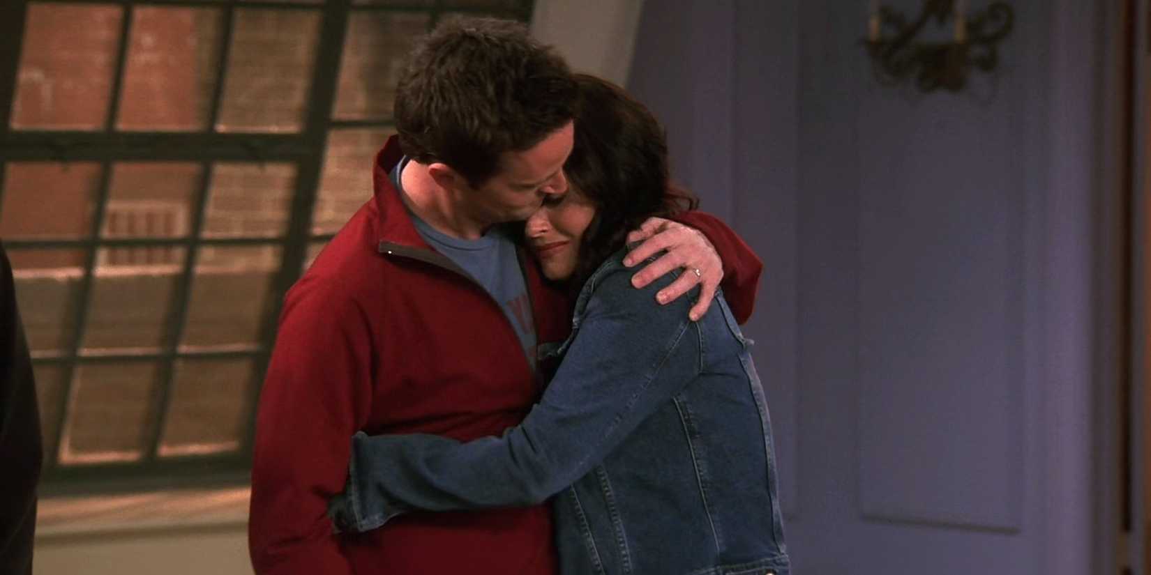 Matthew Perry as Chandler hugging Courteney Cox's Monica in the Friends finale