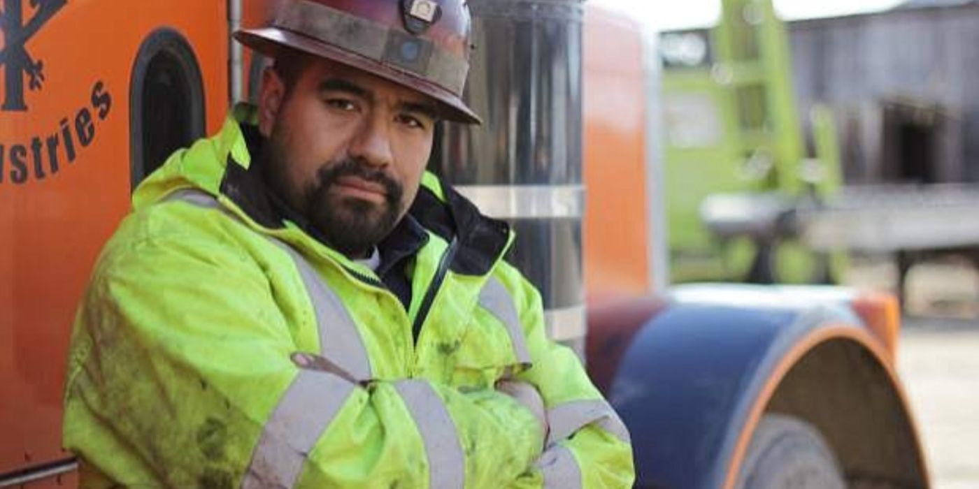 Juan Ibarra standing beside one of his trucks in Gold Rush