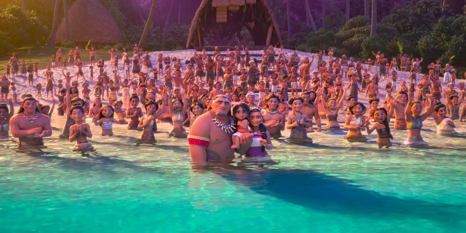 Moana's family and tribe watch her as they stand on the beach in Moana 2