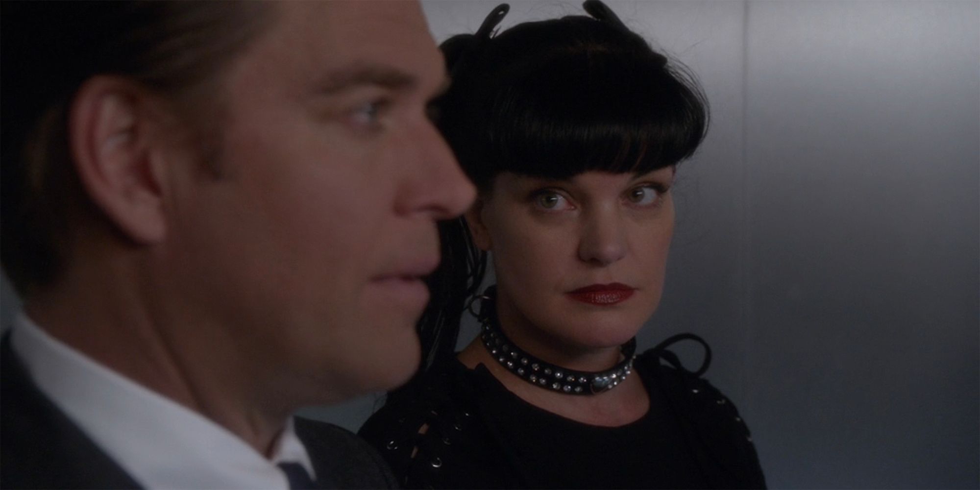 Abby looks seriously at Tony in NCIS