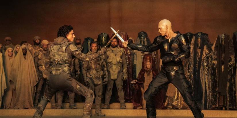 Timothée Chalamet as Paul Atreides and Austin Butler as Feyd-Rautha crossing swords in Dune Part Two