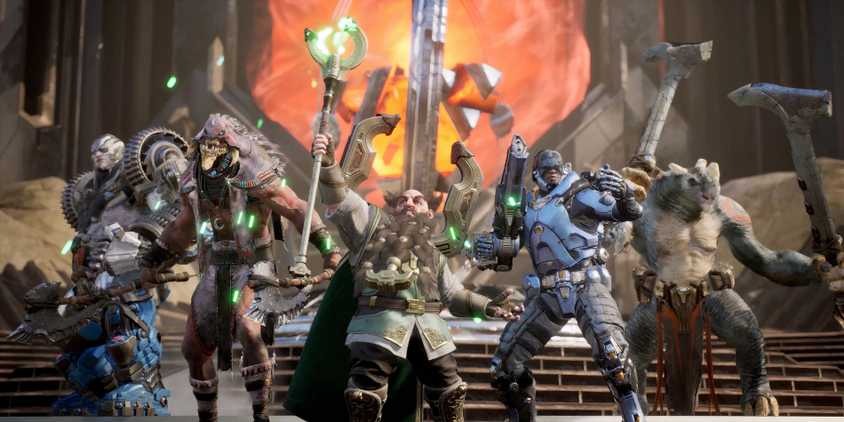 A team of five Predecessor heroes lined up next to each other after a victory, including an armored dwarf, a futuristic soldier, and intimidating monsters.