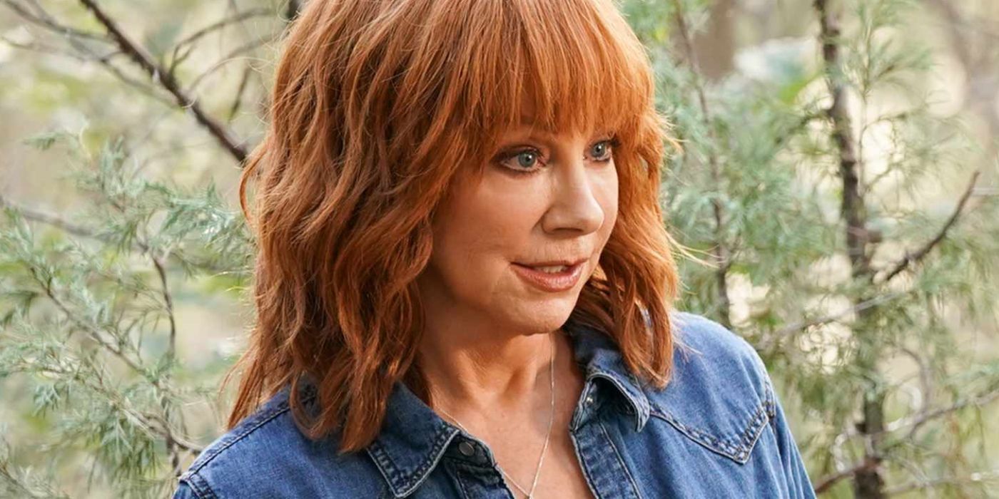 Reba McEntire looks annoyed in Big Sky with trees in the background