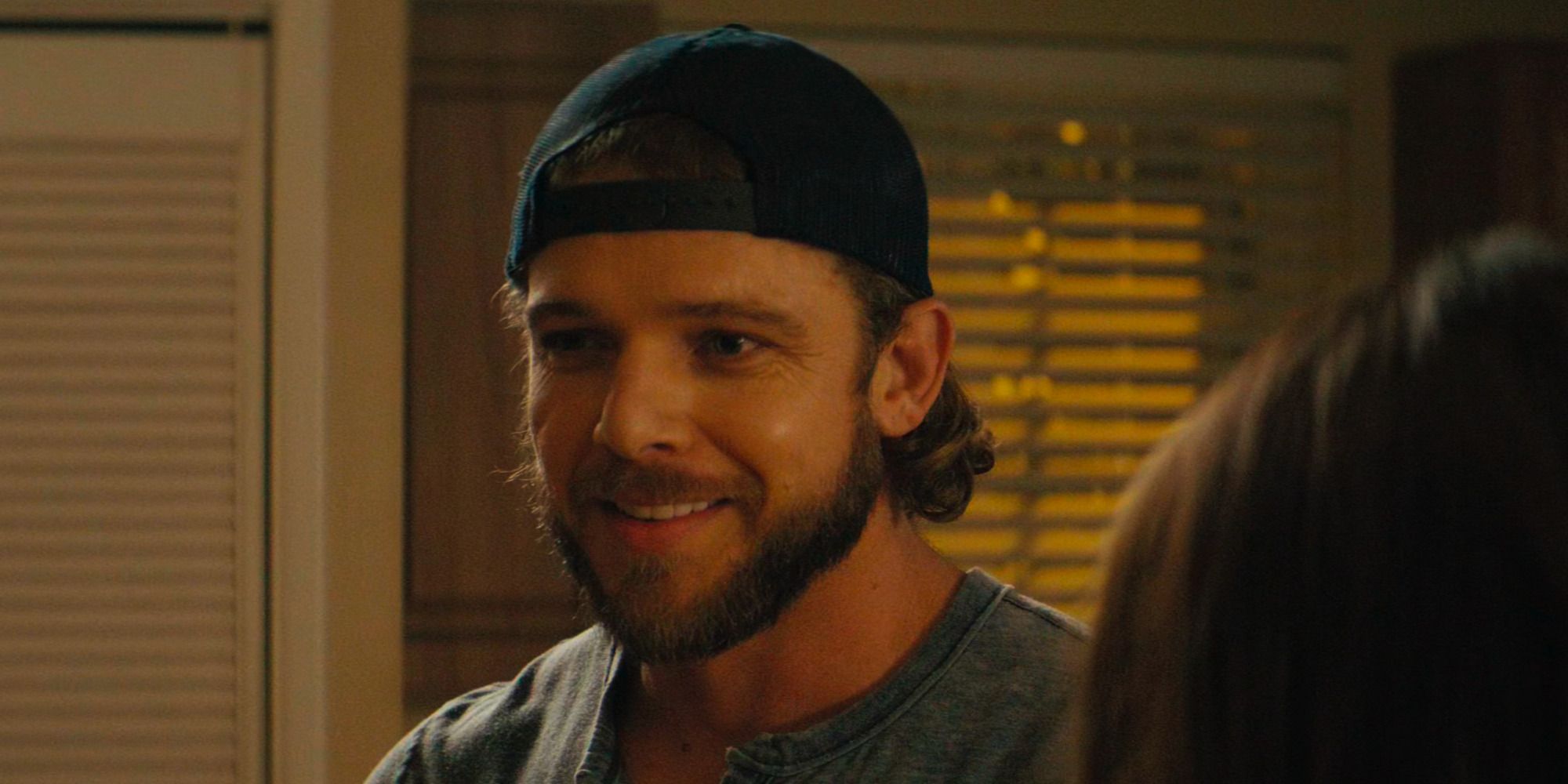 Clay (Max Thieriot) smiles at Stella (Alona Tal) on SEAL Team Season 6 Episode 8