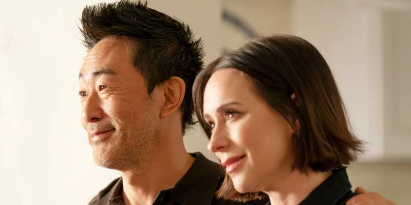 Chimney (Kenneth Choi) and Maddie (Jennifer Love Hewitt) smile on 9-1-1 season 7 episode 10