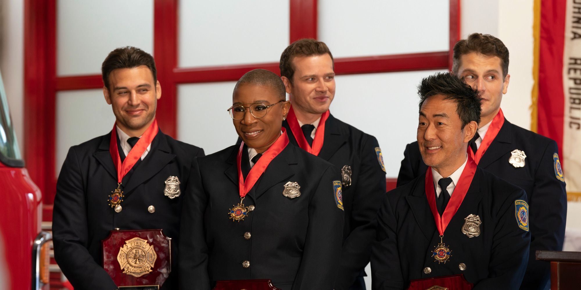 Eddie (Ryan Guzman), Buck (Oliver Stark), Hen (Aisha Hinds), and Chimney (Kenneth Choi) smile on 9-1-1 season 7 episode 8