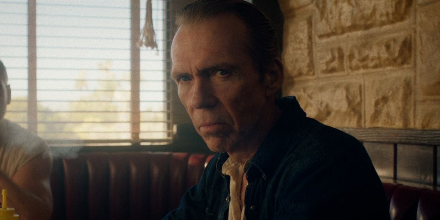 Richard Brake as Beau looking intently in The Last Stop in Yuma County