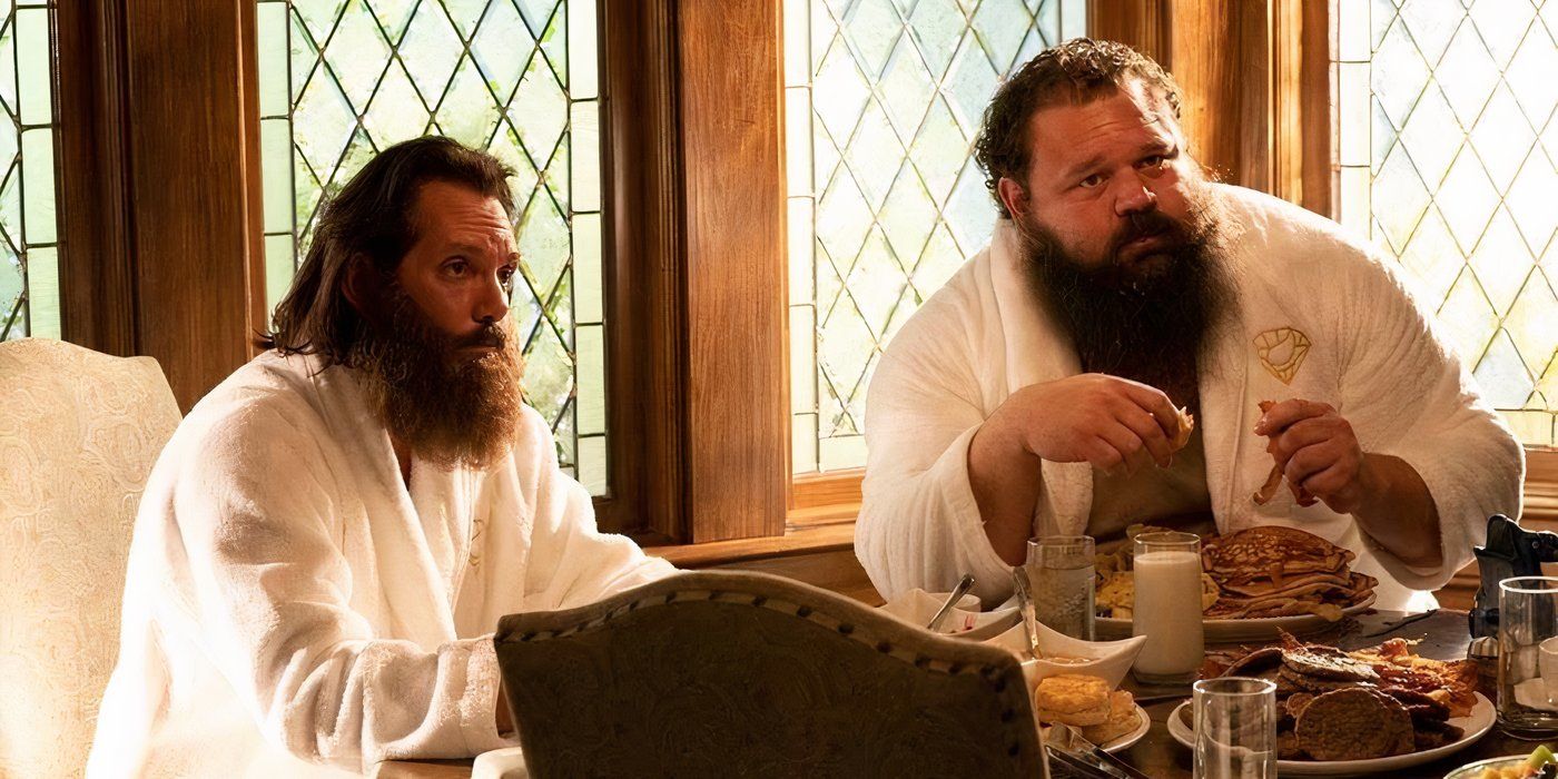 Robert Oberst and Lukas Haas eat in robes in The Righteous Gemstones